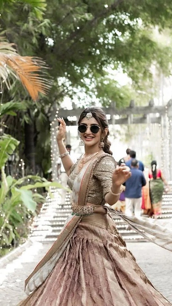 Sreeleela Dazzles In Traditional Kanjeevaram Half Saree At KGF Cinematographer Bhuvan Gowda’s...