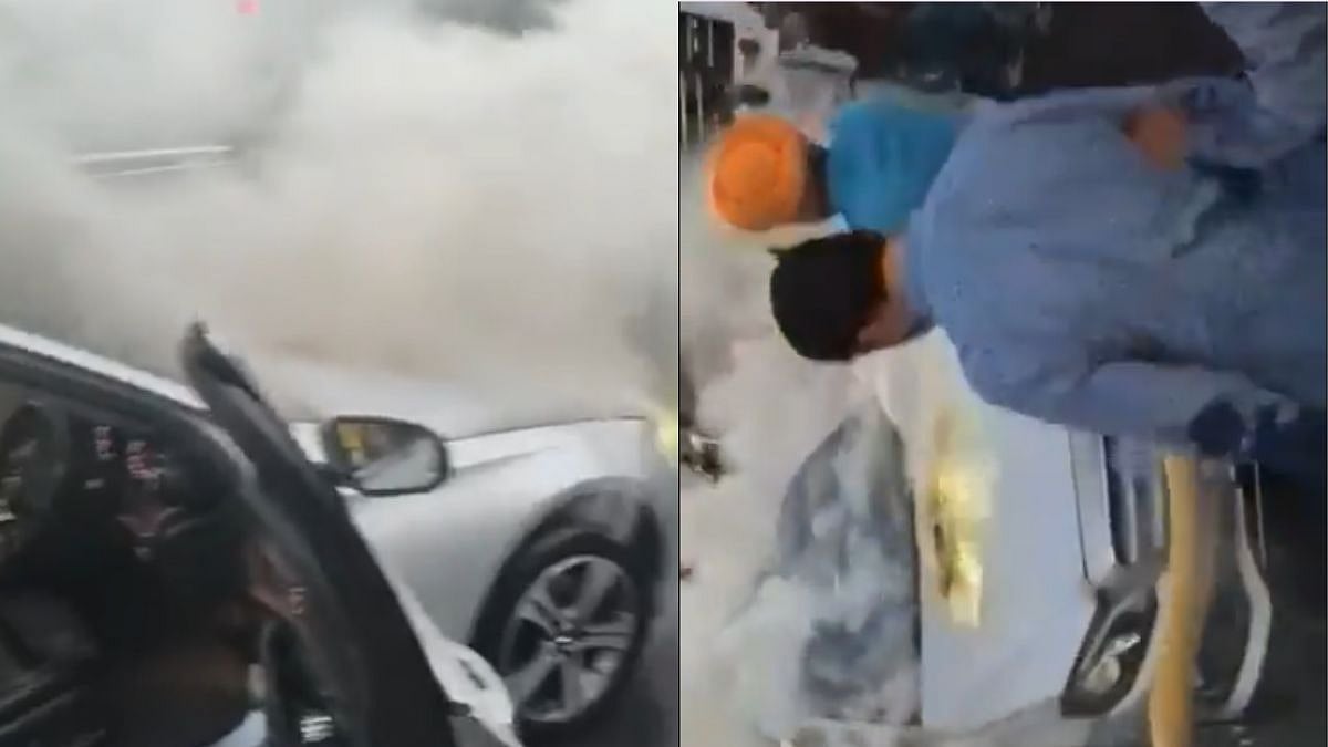Mercedes Catches Fire At Traffic Signal, Cops Rescue Woman, 5-Year-Old Child In Delhi - VIDEO 