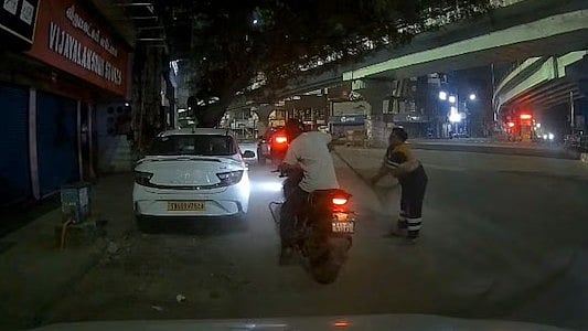 Woman Sanitation Worker Hits Biker With Broom After He Flashes At Her In Chennai - VIDEO