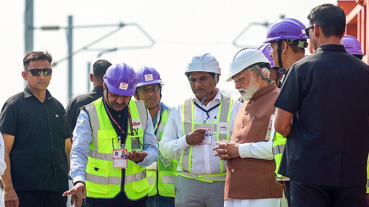 PM Modi Reviews Progress Of Mumbai–Ahmedabad Bullet Train Project At Surat Station 
