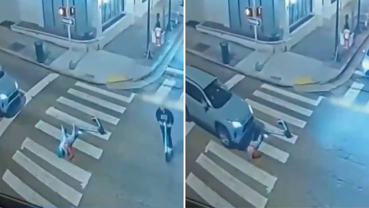 CCTV Shows Electric Scooter Rider Run Over At Traffic Light As Driver Moves Forward Unaware In...