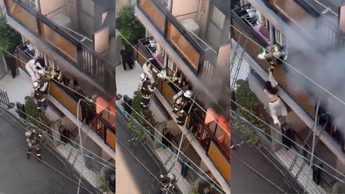 On Camera: Panicked Japanese Woman Kicks Firefighter Off Ladder During Rescue From Flat Fire, Falls From 2nd Floor After Losing Balance 