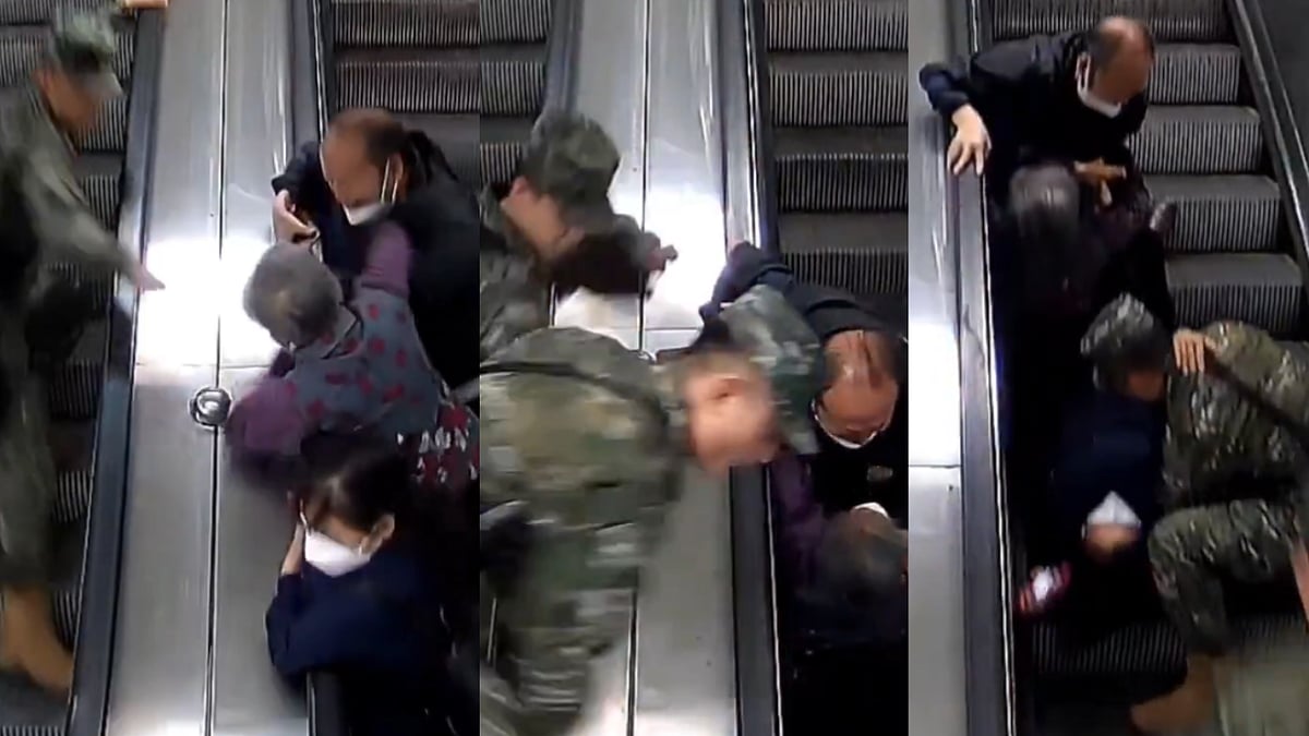 China: Alert Cops Climb Guardrail To Rescue Elderly After Slipping & Falling On Moving Escalator In...
