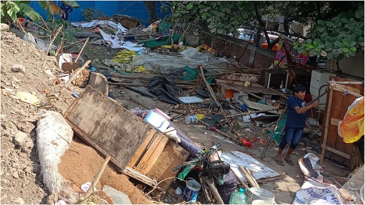 NMMC demolition squad removes unauthorised huts erected on an open plot in Sector 17, Sanpada, during an anti-encroachment drive