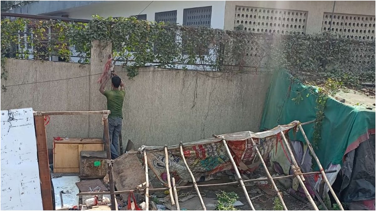 NMMC demolition squad removes unauthorised huts erected on an open plot in Sector 17, Sanpada, during an anti-encroachment drive