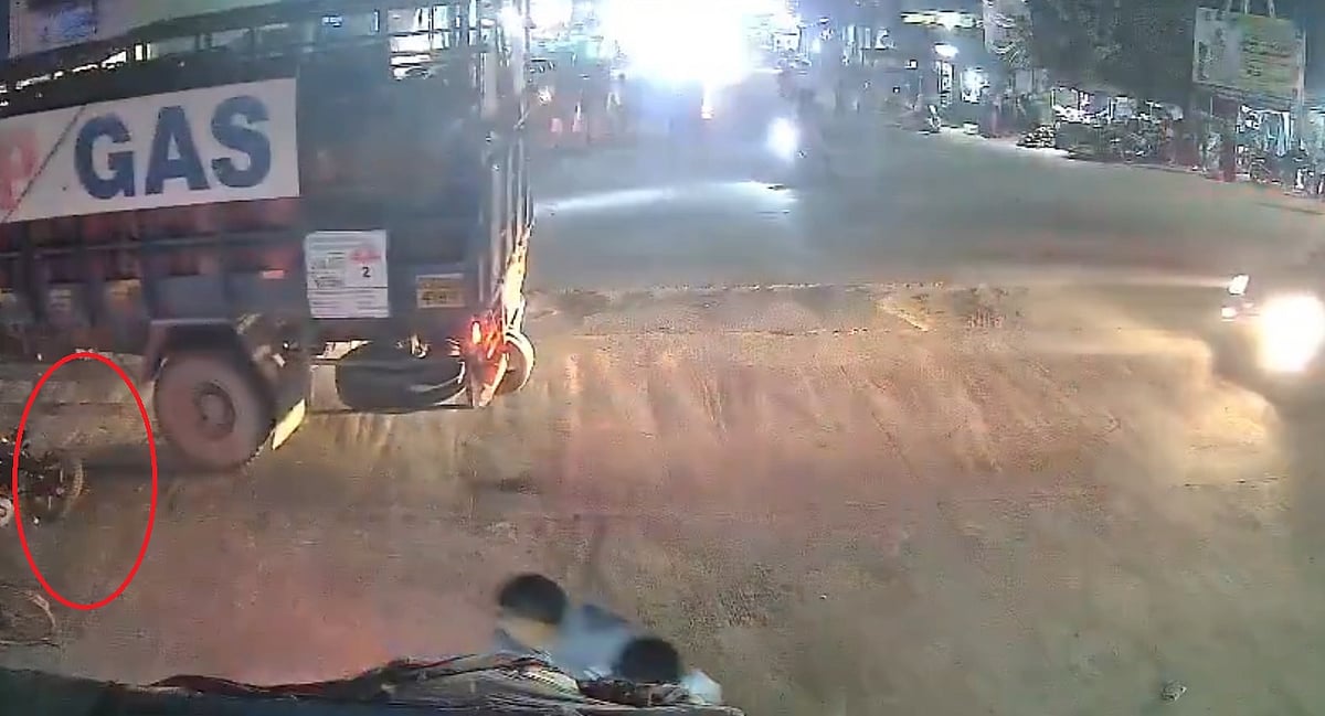 Biker Crushed To Death As He Skids Off While Overtaking Lorry In Telangana's Hanumakonda | VIDEO