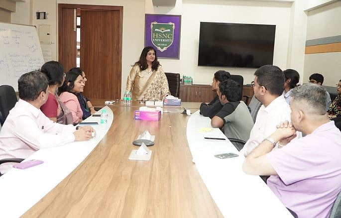 Col. Prof. Dr. Hemlata K. Bagla, Vice-Chancellor, HSNC University, Mumbai, interacting with faculty members, coordinators and student participants during the University-Level Selection Rounds of Aavishkar AY 2025–26, reinforcing the university’s commitment to fostering a strong research culture, innovation and academic excellence among students.