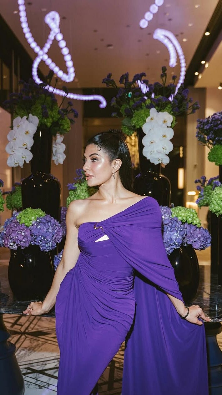 Jacqueline Fernandez Takes Over Dubai In ₹48,500 Saree-Inspired Purple Gown