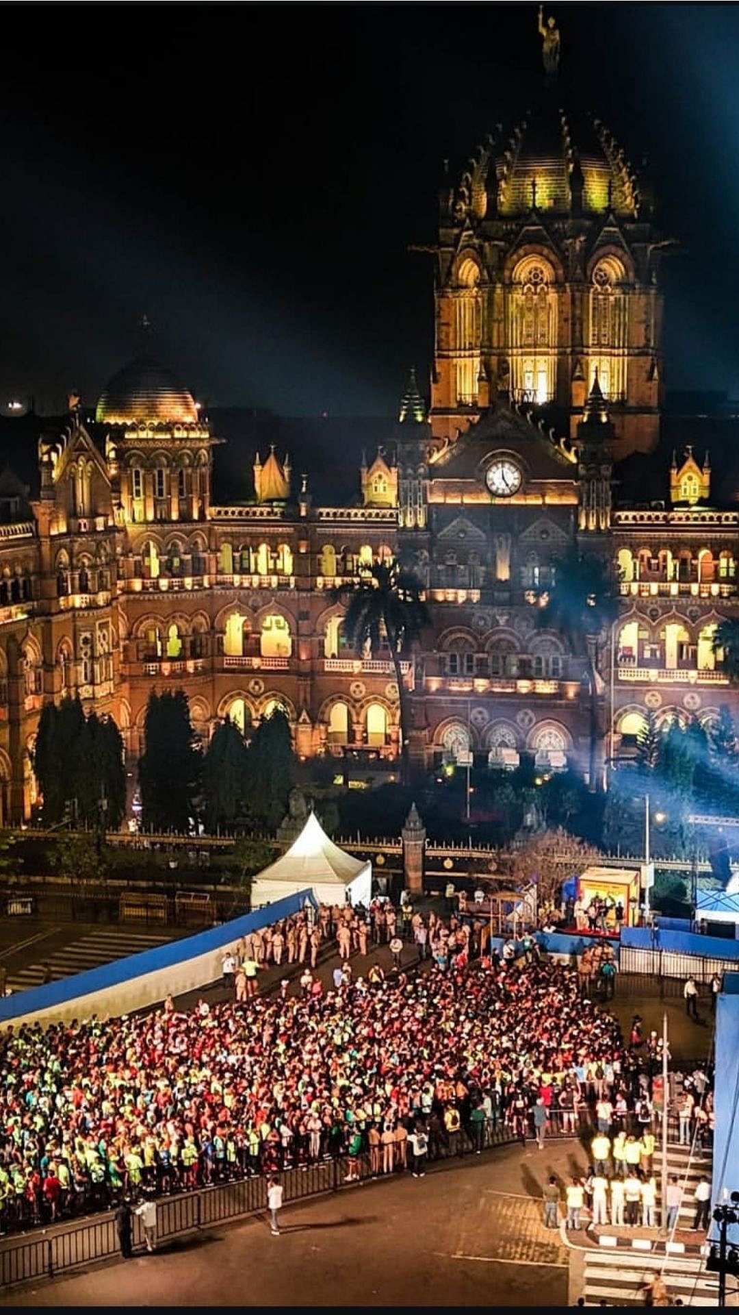 Anticipation builds outside Chhatrapati Shivaji Maharaj Terminus as thousands assemble before the start of the Tata Mumbai Marathon.
