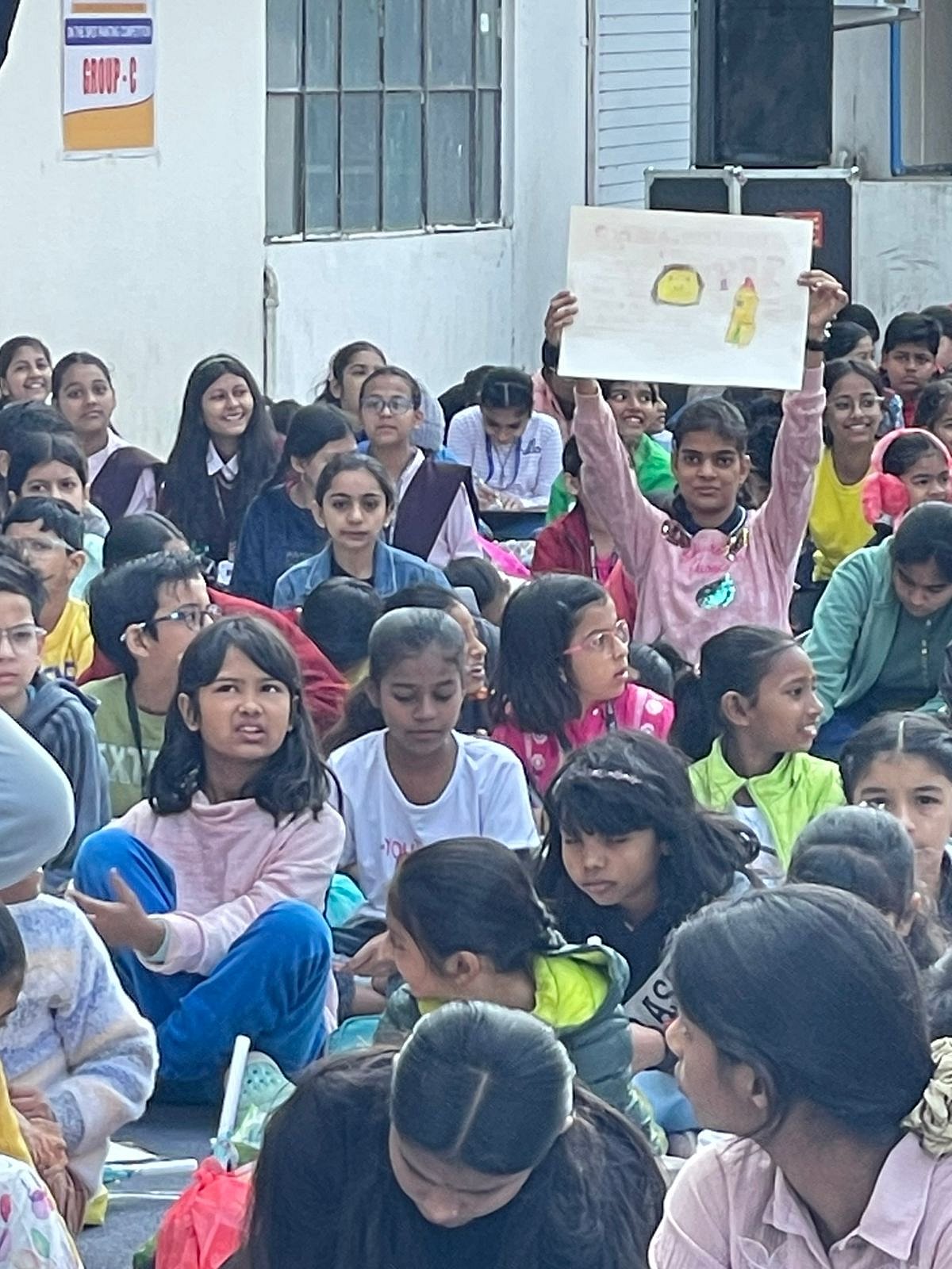 Samridhi Gautam, a student from special category excitedly shows her drawing.