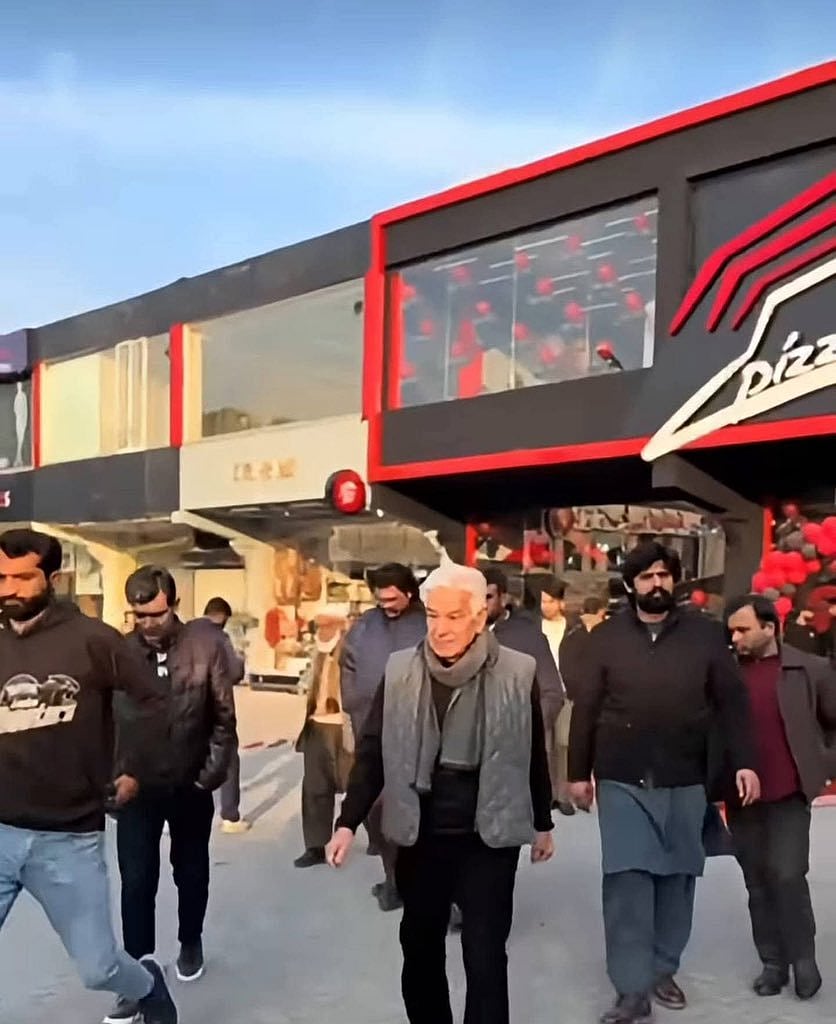 Khawaja Asif during inauguration ceremony of Pizza Hut store in Sialkot