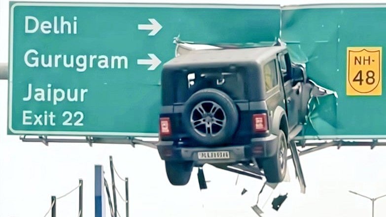 Fact Check: Viral Video Mahindra Thar Stuck On 'NH-48' Signboard; Real Or AI? 