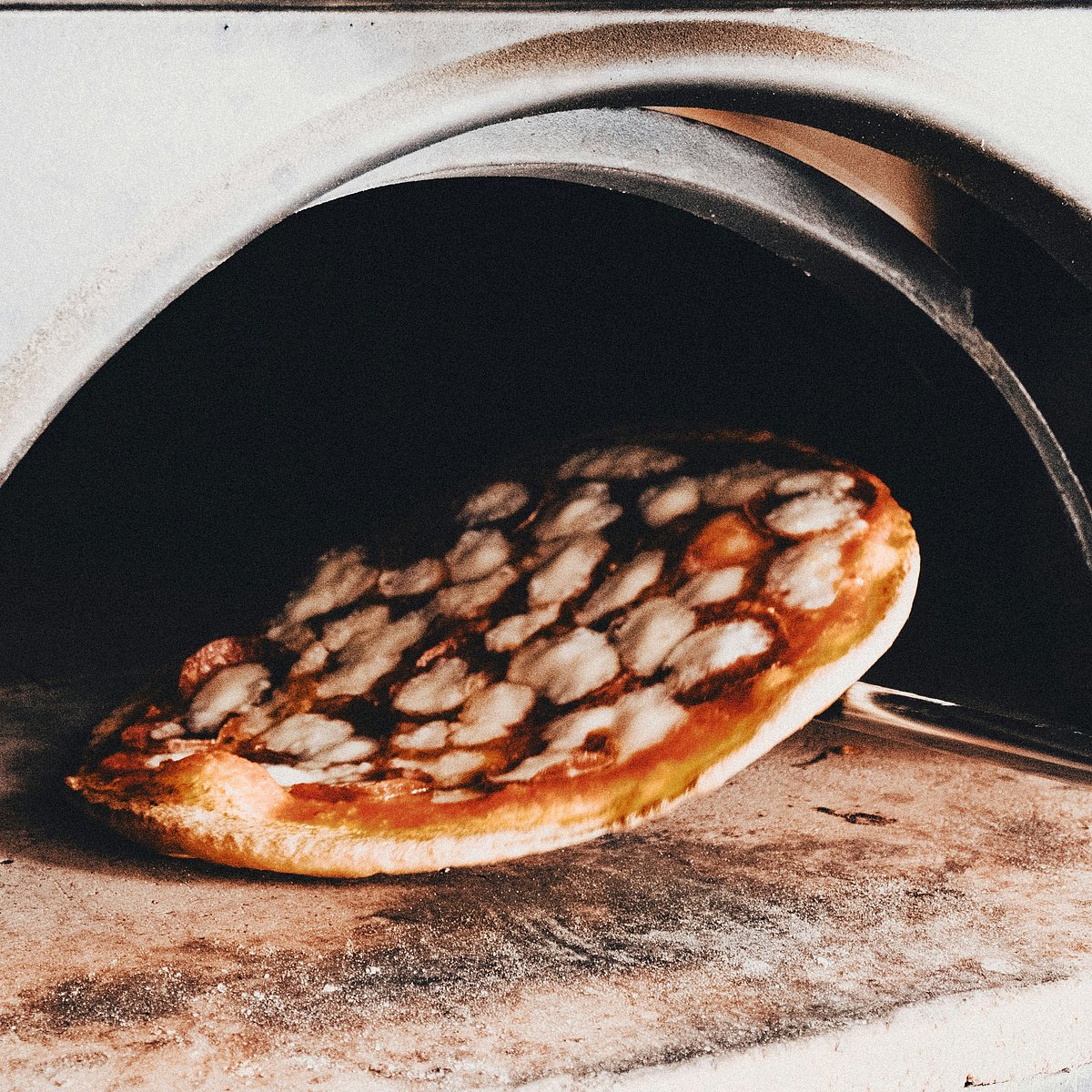 Pizza cooking on stone 