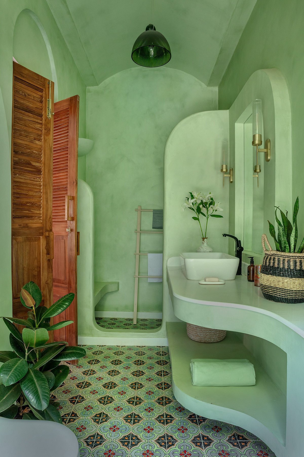 Serene green bathroom within Villa Giulietta by Vianaar