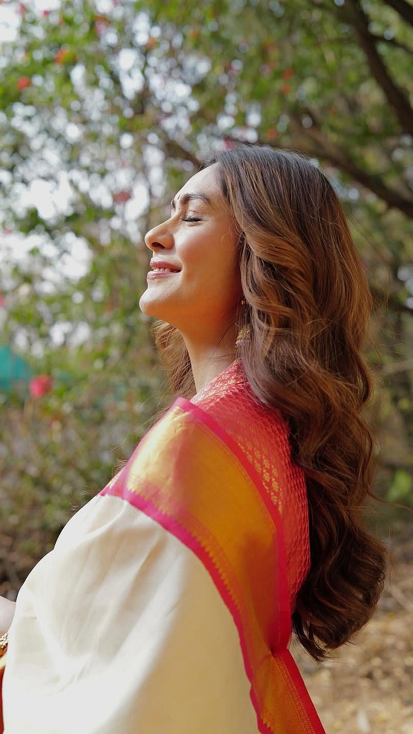 Mrunal Thakur Stuns In Timeless Silk Saree On Her Visit To Tirupati Balaji Temple Along With Telugu Star Adivi Sesh 