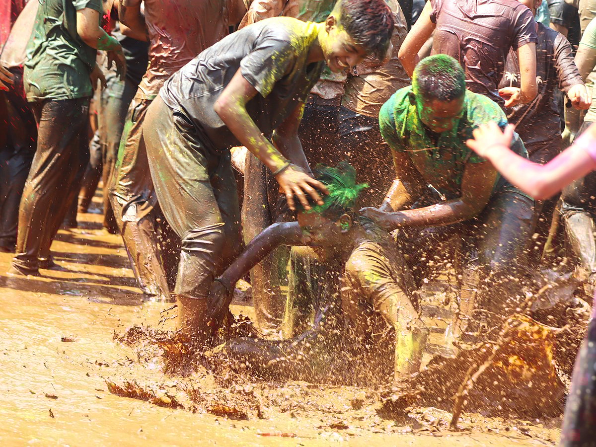 Covered in colours and mud residents celebrated the festival with carefree joy