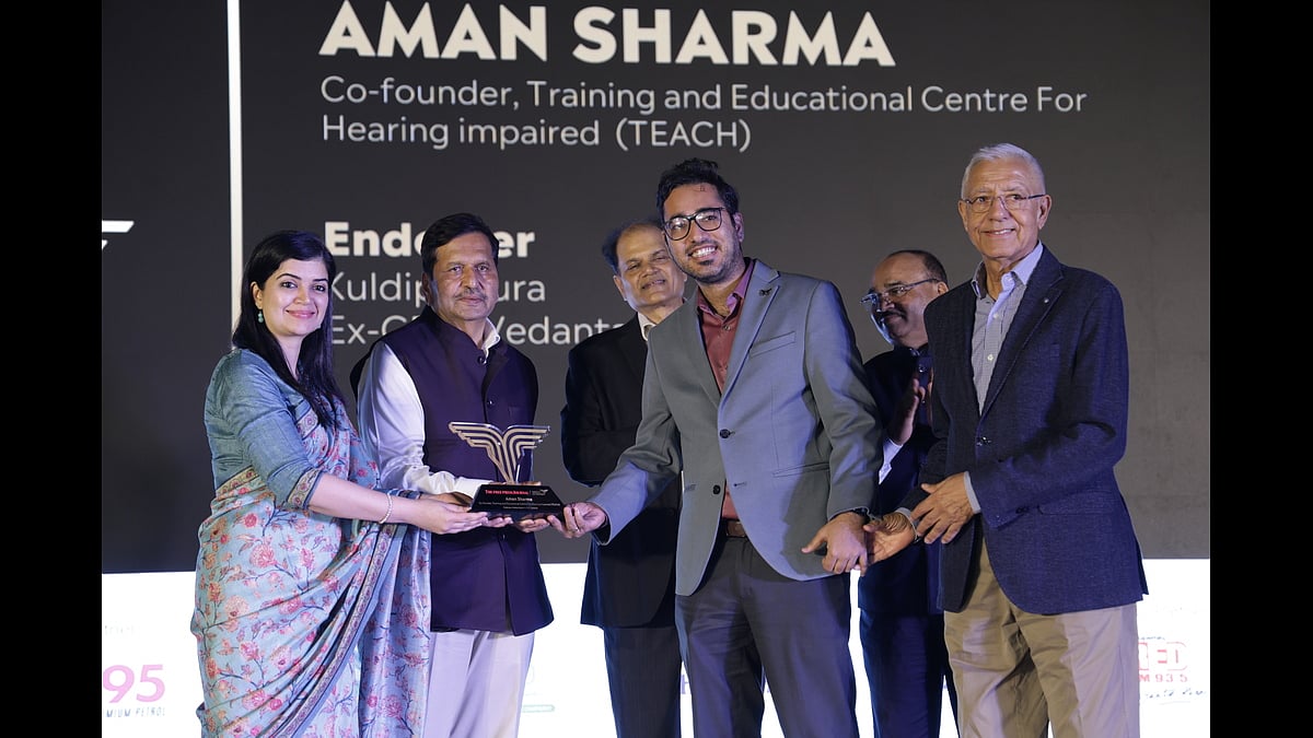 Aman Sharma, Co-founder, Training and Educational Centre For Hearing impaired  (TEACH), receiving the award from Maharashtra minister Mangal Prabhat Lodha and others. On the far right is Kuldip Kaura former CEO, Vedanta  