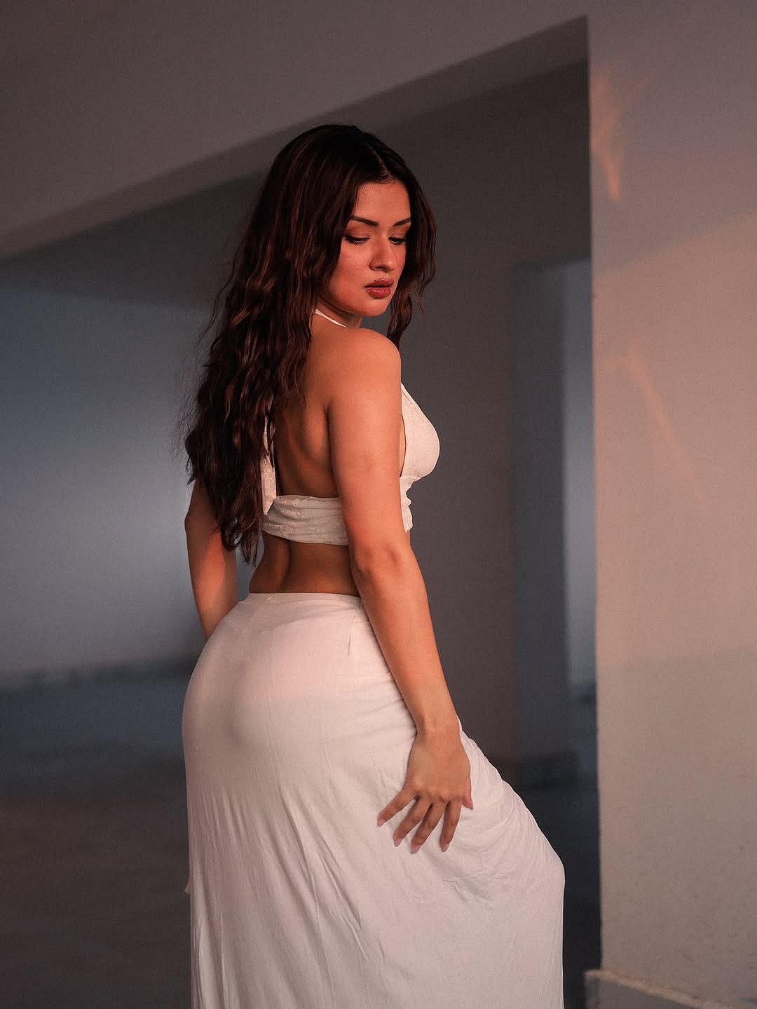 Her poses exude confidence and grace, balancing sensuality with elegance in a very effortless way.