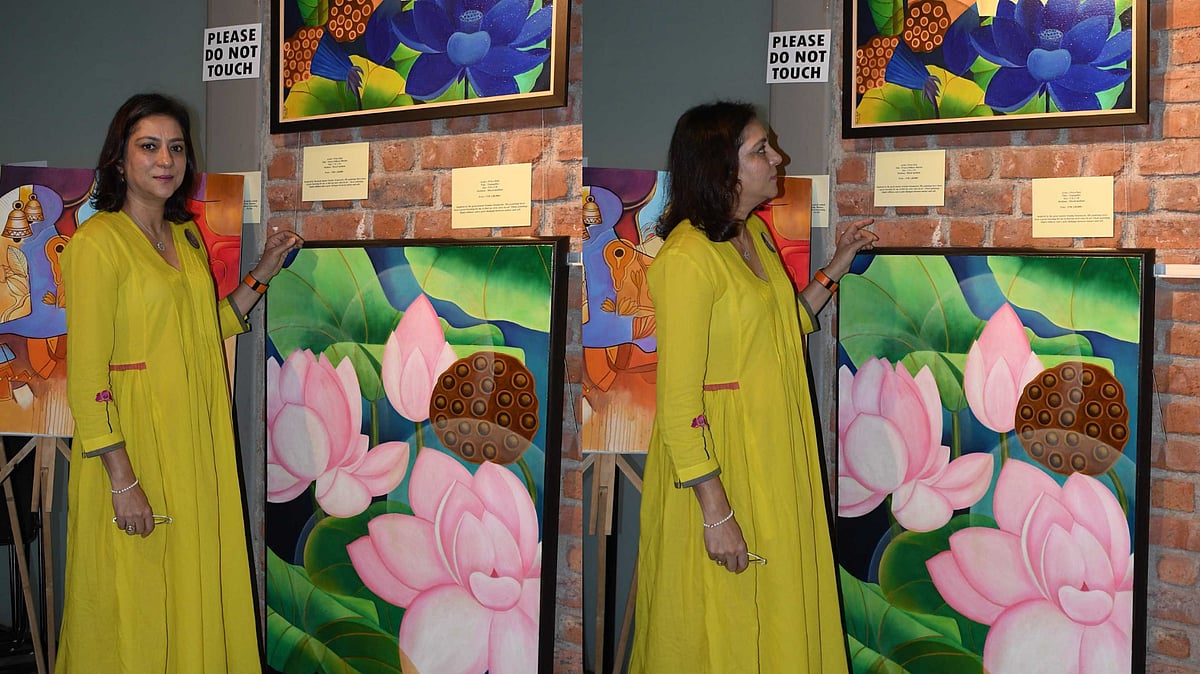 Priya Dutt with her painting at The Colour Collective Exhibit