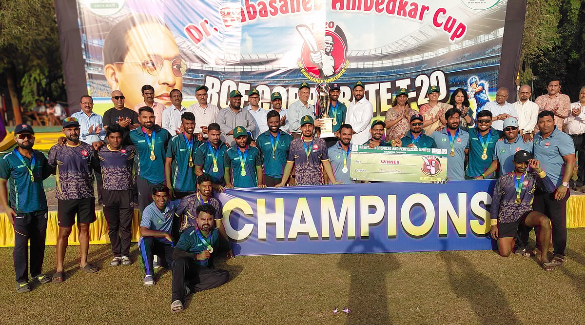 The players of the victorious Western Railway cricket team winners of the Dr. Babasaheb Ambedkar Cup in the RCF T20 Cricket Tournament 2026 proudly pose with the ‘Winners’ trophy along with MCA President, Ajinkya Naik and Unmesh Khanvilkar, Hon Secretary, MCA and RCF CMD, Shiva Kumar Subramanium, Nazat Shaikh, D (F) and Rutu Goswami, D (T) and Dr. Rahul Jagtap CVO, RCF at the RCF ground, Chembur on Friday.