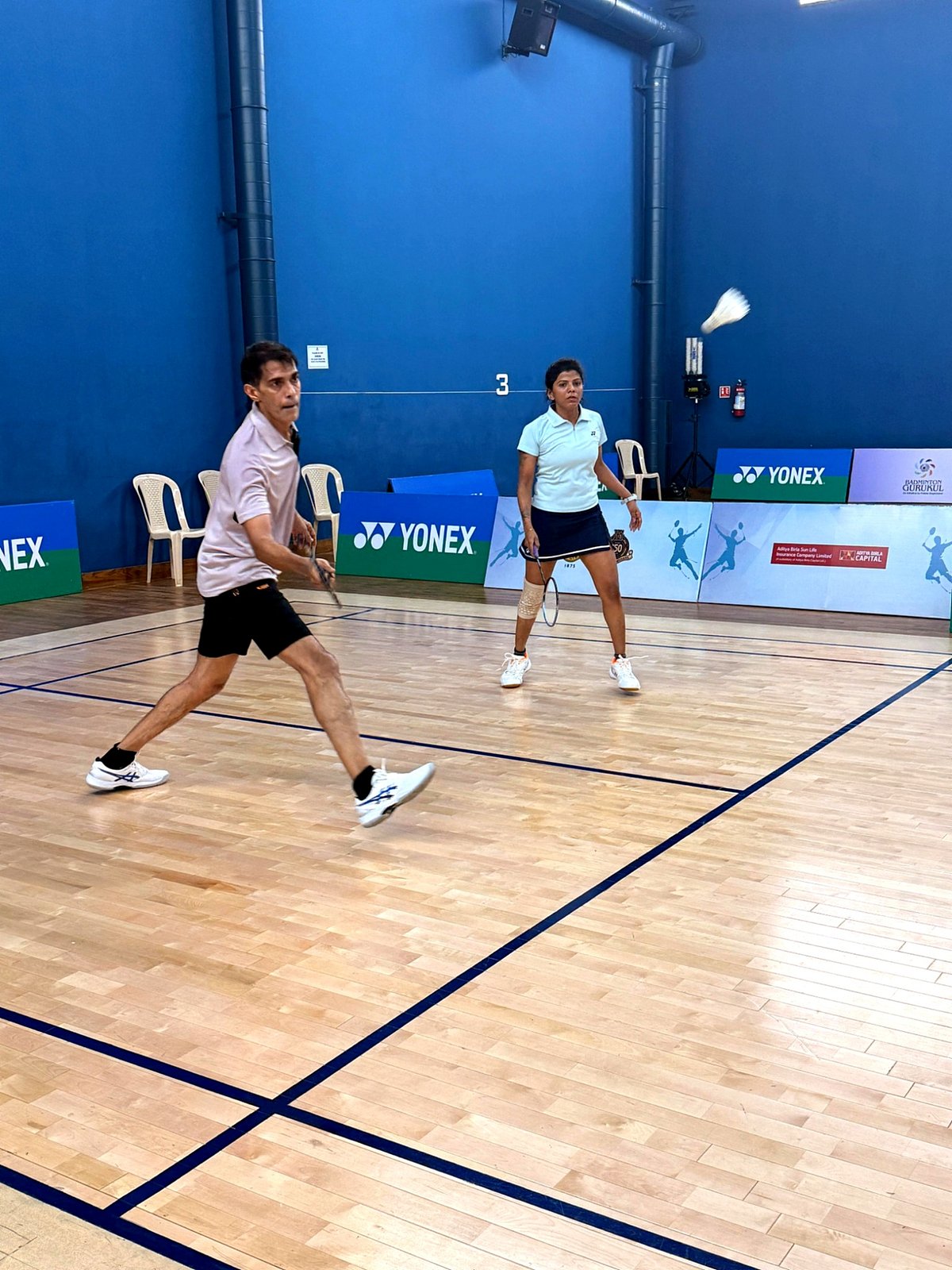  Player in action at 32nd G.D. Birla Memorial Open Veteran Masters Inter-Club Badminton Tournament