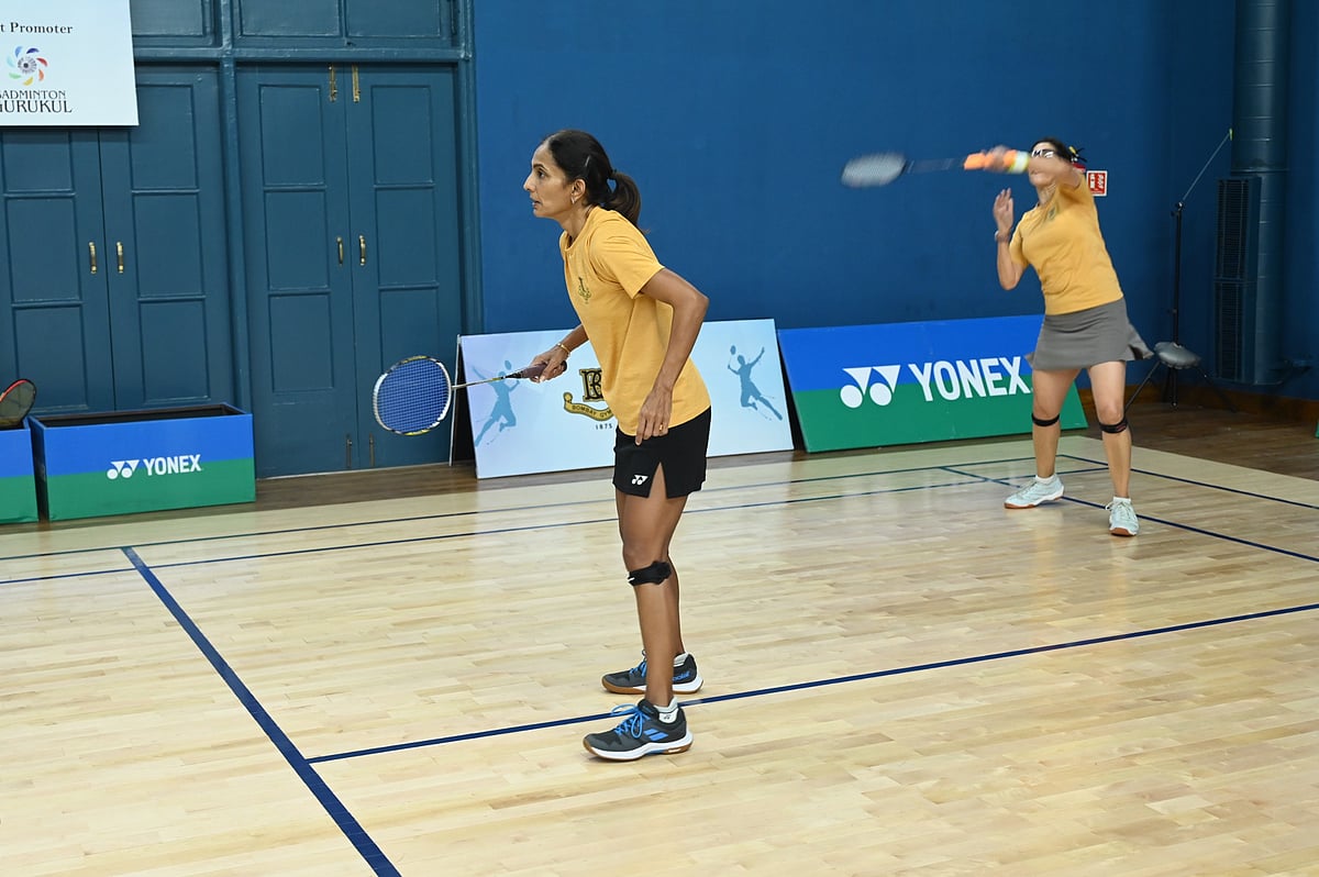 Player in action at 32nd G.D. Birla Memorial Open Veteran Masters Inter-Club Badminton Tournament