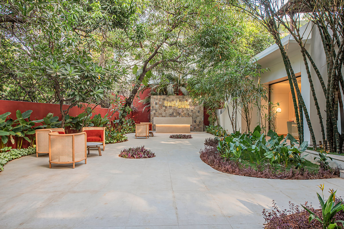 Time Café nestled within a charming garden offers an outdoor area for an immersive experience