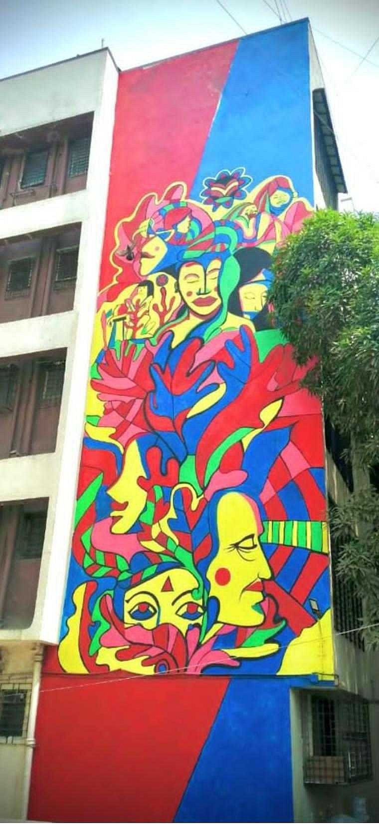A 5 storey building painted for the 2nd edition of the Ladies-First Initiative