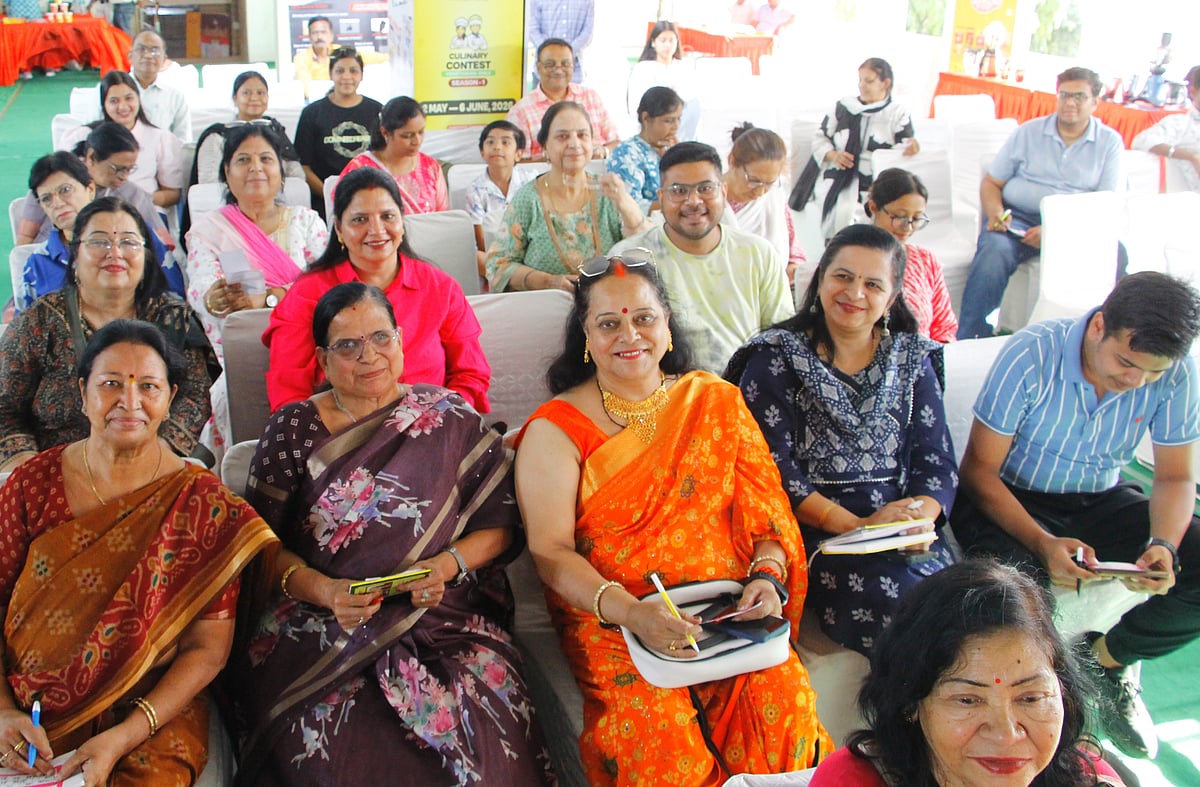  Family members and supporters of the contestants cheer from the audience during the Contest 