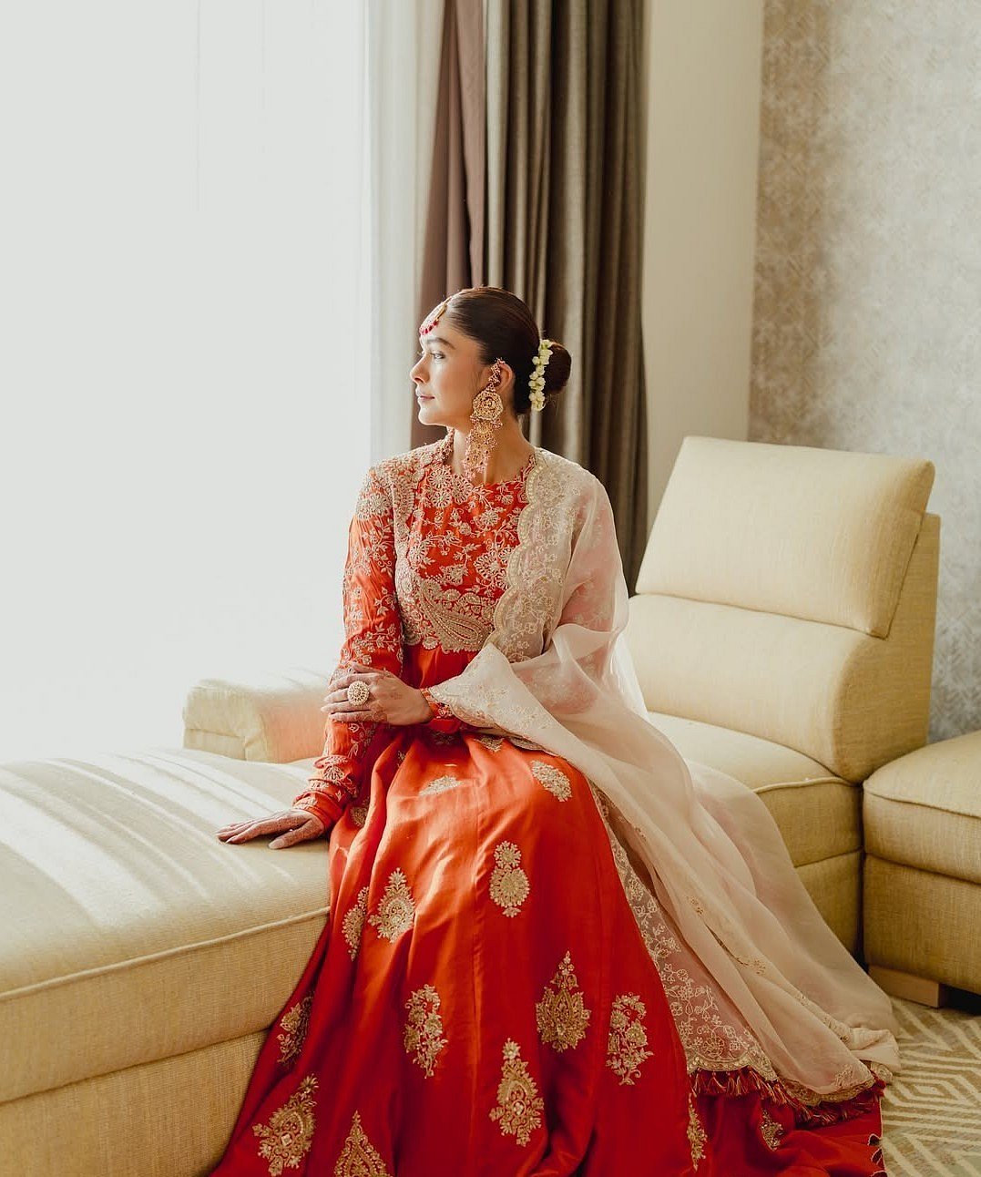 Mrunal Thakur Looks Regal In Backless Orange Anarkali, Gajra-Adorned Hair