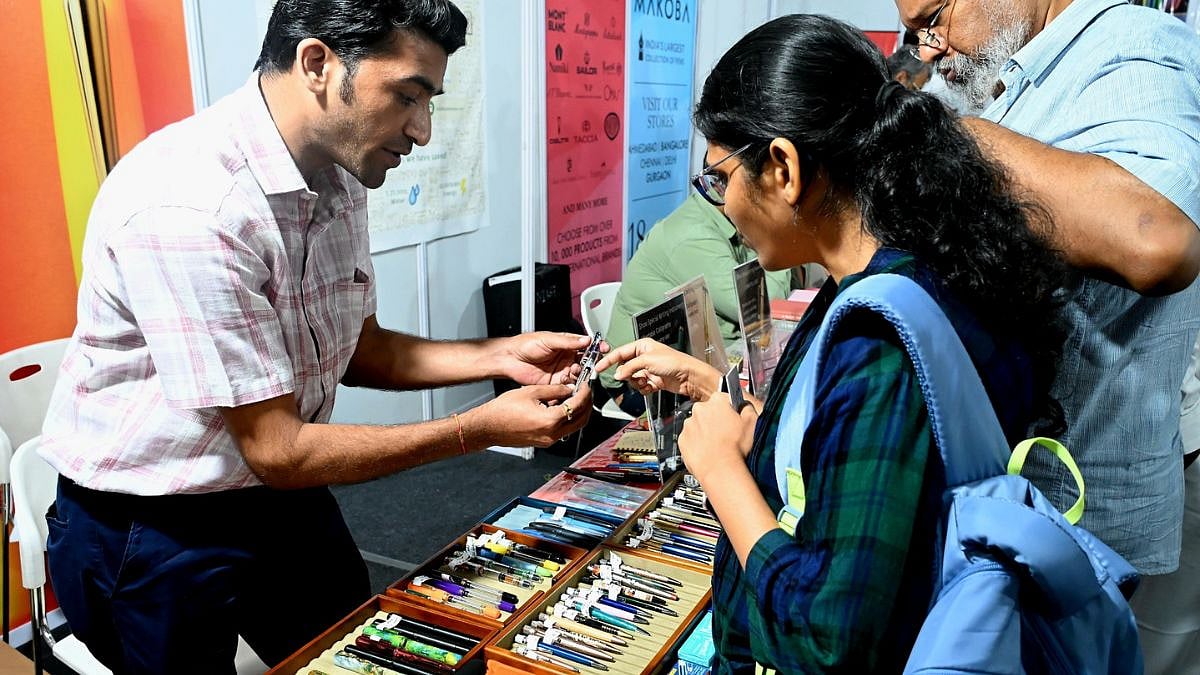 People browse and shop for different types of pens at the India Pen Show
2026 at Nehru Centre 