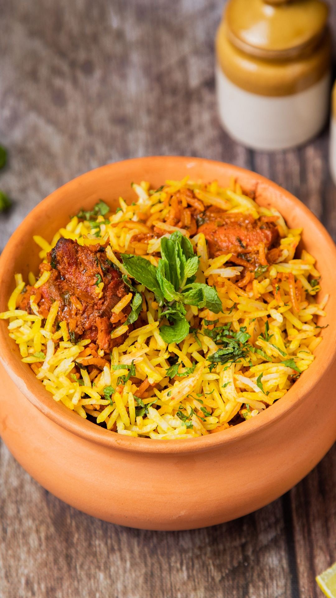 Mutton Biryani is a fragrant rice dish cooked with spiced mutton, saffron, and herbs, often served as the highlight of Bakra Eid feasts.