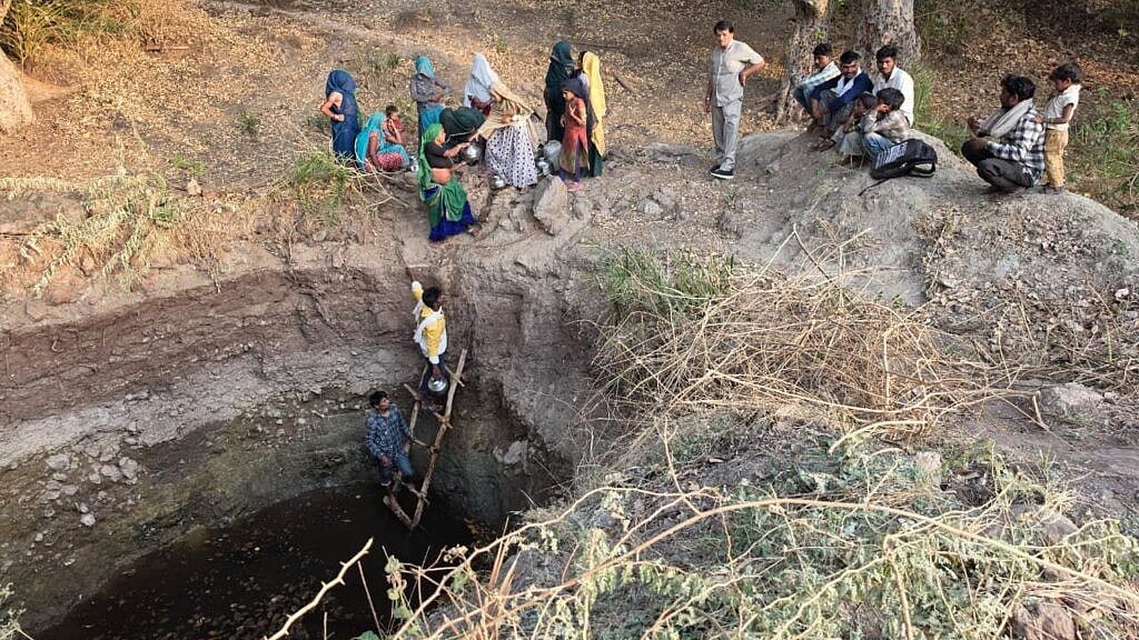 Tribal Families Forced To Fetch Water From 12-Foot-Deep Pit In Udaygarh