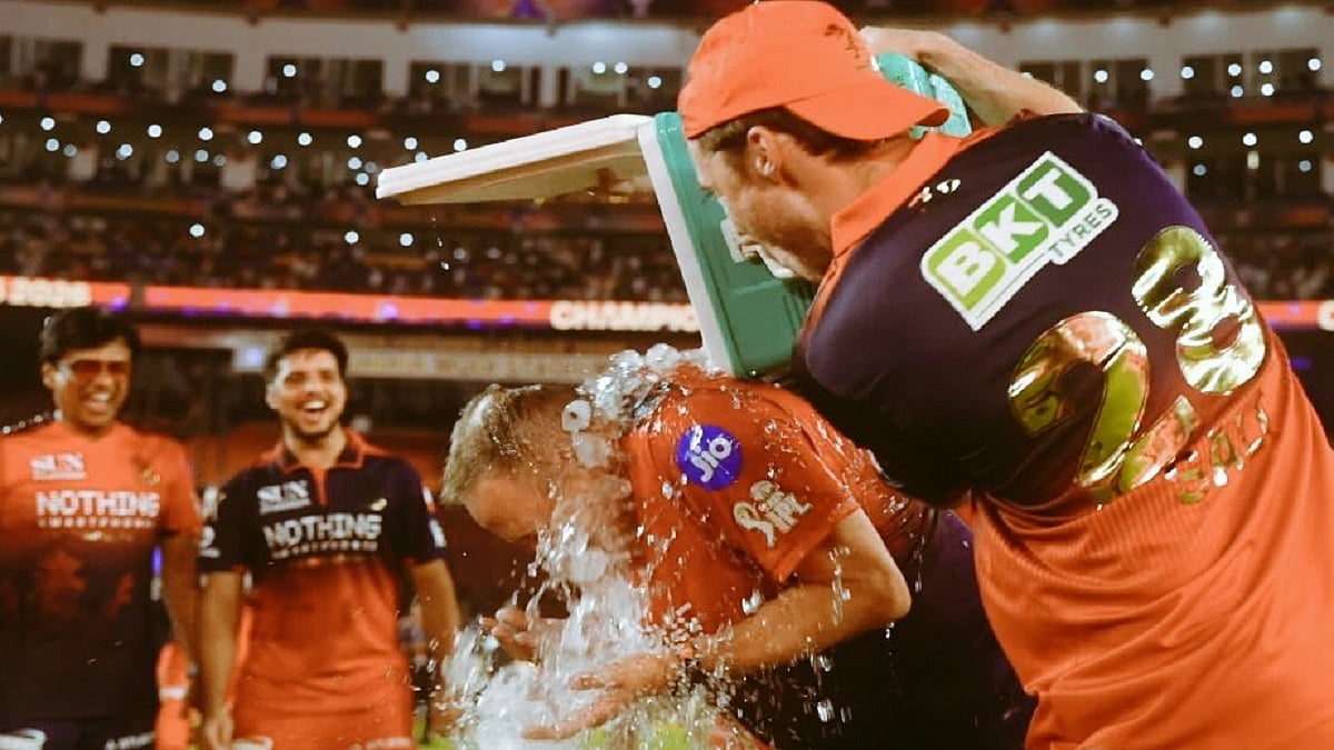 VIDEO: RCB Pranksters Tim David And Phil Salt Empty Ice Box On Coach Andy Flower's Head During IPL 2026 Title Celebrations