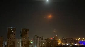 US strikes near Larak Island; Iran retaliates with missile claims and sea-mine warnings