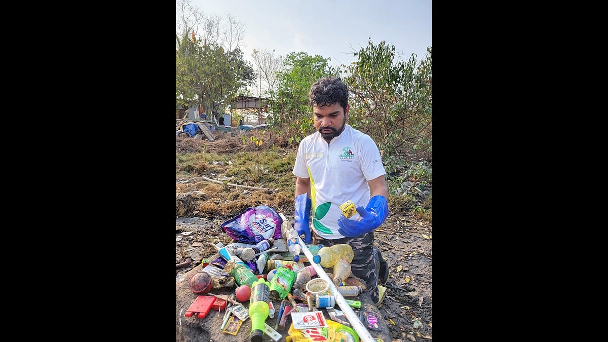 Dharmesh Barai at a mangrove clean-up