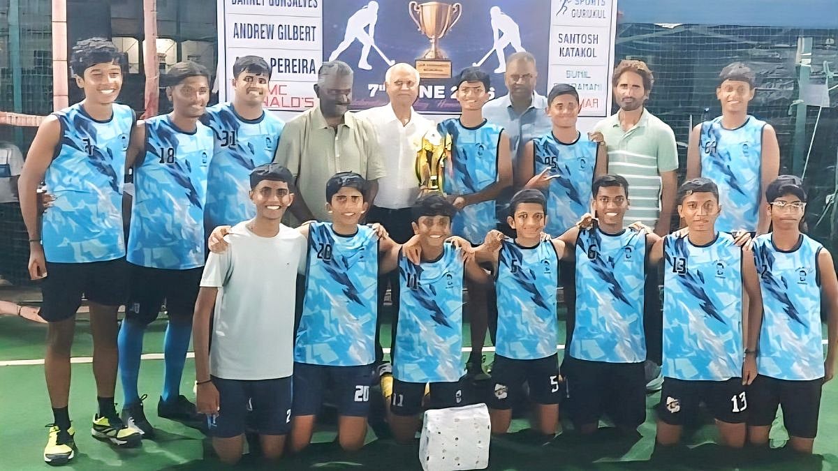 The victorious Don Bosco boys seen with the Boys' U-16 winners' trophy along with Olympians and former Indian captains V. Bhaskaran, Zafar Iqbal and Joaquim Carvalho