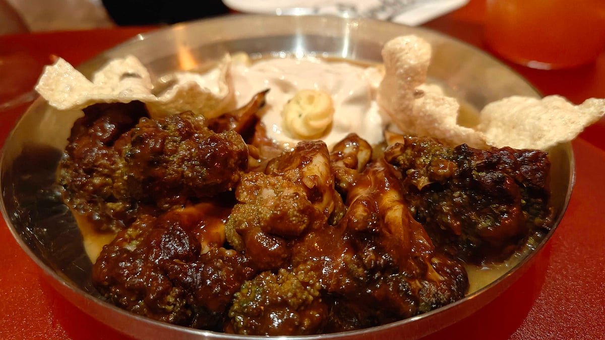 Punchline Roast Broccoli is served with papad