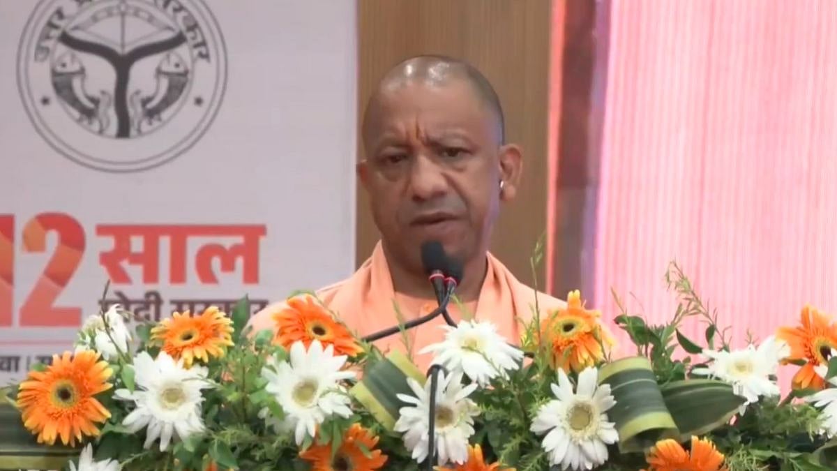 UP CM Yogi Adityanath Distributes Approval Letters, Cheques And Keys To Beneficiaries Of Various Schemes