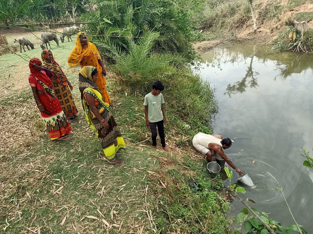 Villagers fetching water from dirty nullah