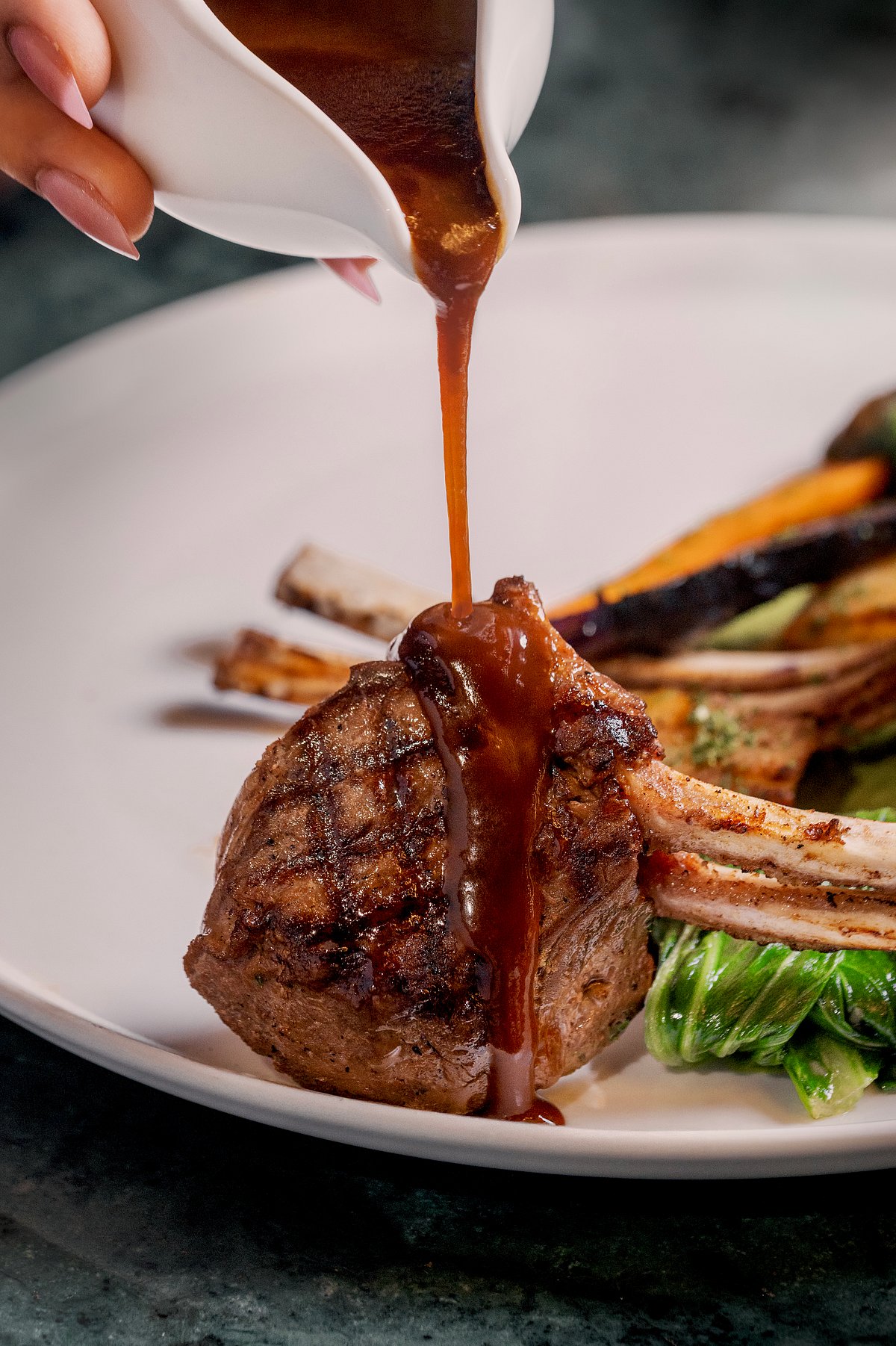 New zealand lamb rack with prune ginger and leek soubise  