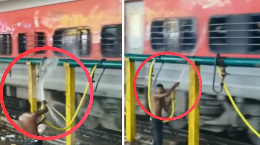 Man Spotted Spraying Water On Moving Train Railway Using Track Pipe At Bhopal Railway Station | VIDEO