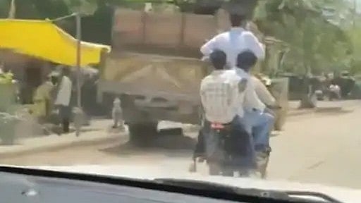 VIDEO Shows Youth Standing On Moving Bike & Talking On Phone In MP's Dabra | VIDEO    