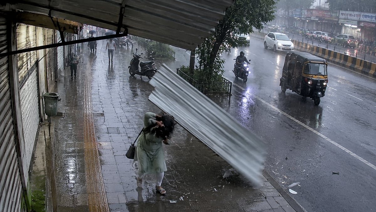 CCTV Footage Shows Woman Injured After Tin Sheet Falls On Her During Heavy Rains In Vasai-Virar Area