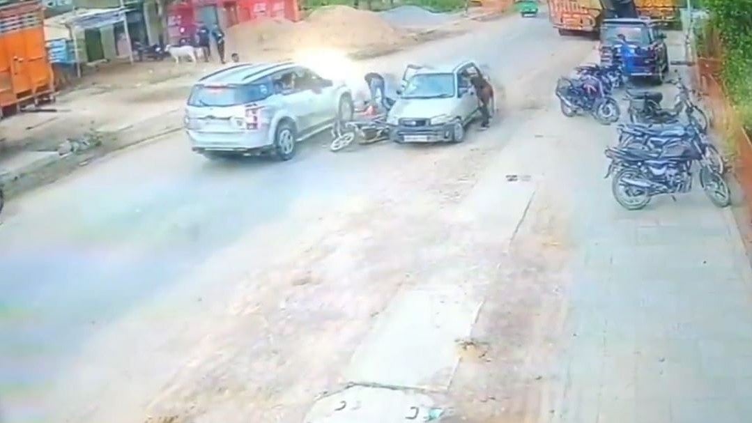 Video: Father, Son Run Over Moments After Motorcycle Hits Open Car Door In Jhansi