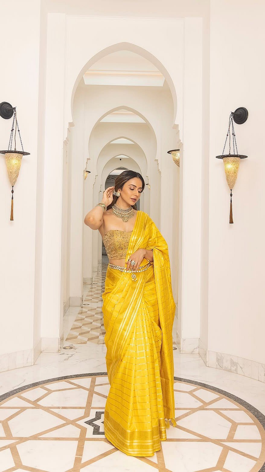 Rakul Preet Singh Takes Over The Ramayana Delhi Event In Strapless Yellow Saree Look With Royal Jewels