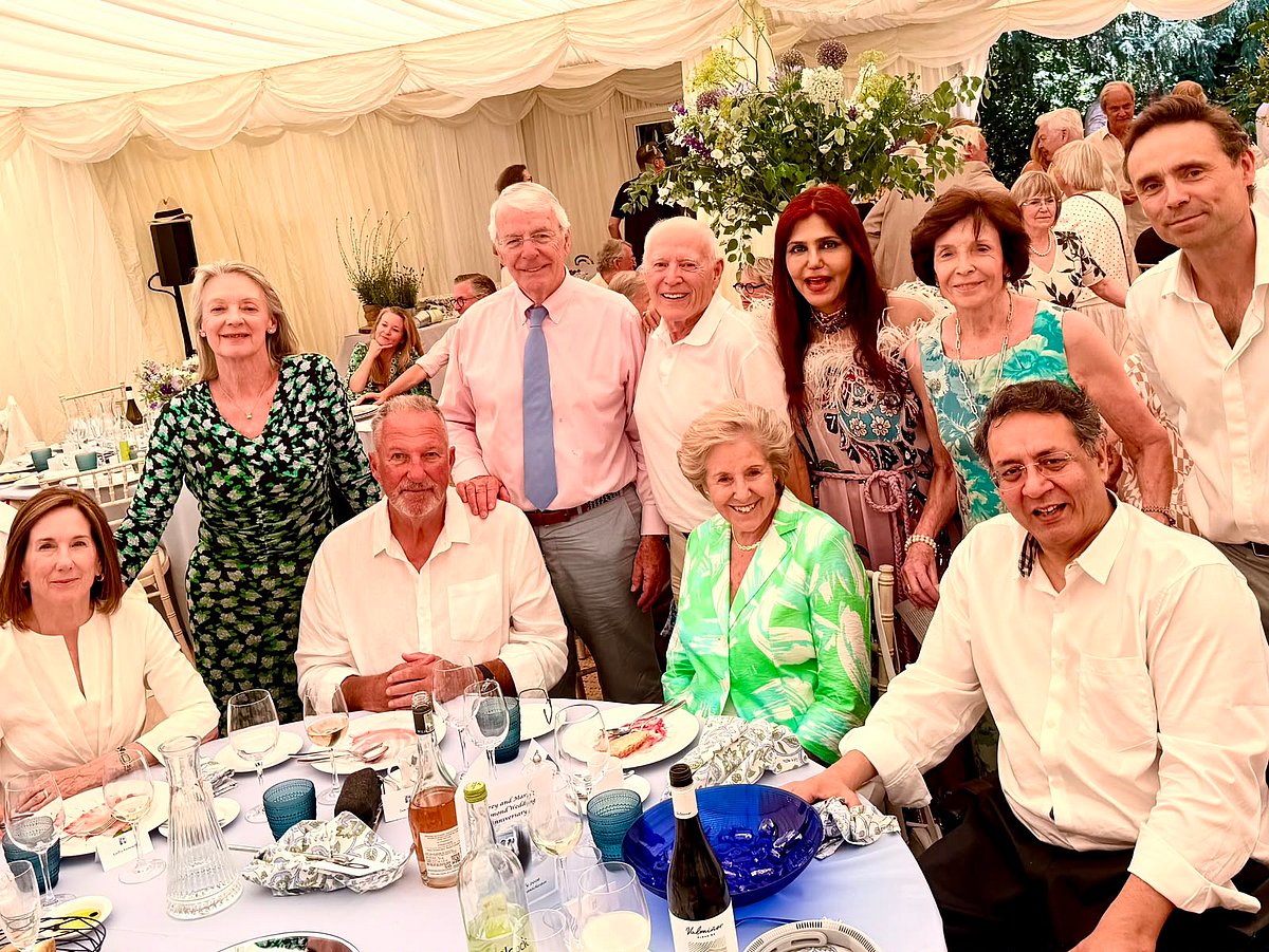 Former British Prime Minister Sir John Major, Dame Norma Major, cricket legend Sir Ian Botham and Lady Kathryn Botham, Hollywood producers Kathleen Kennedy and Frank Marshall of E.T. and The Bourne Identity fame with KRS Jamwal and Nisha JamVwal