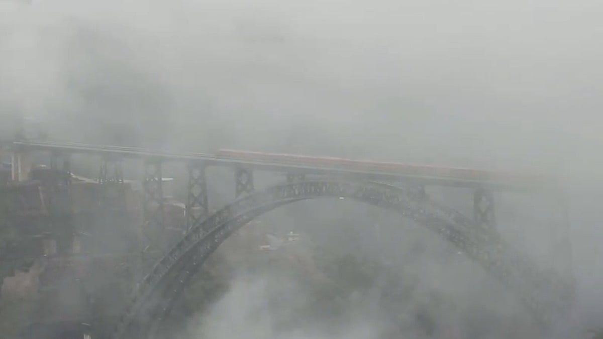 Vande Bharat Glides Across World's Highest Chenab Rail Bridge Amid Dense Fog In Monsoon; Railways Share Breathtaking Video