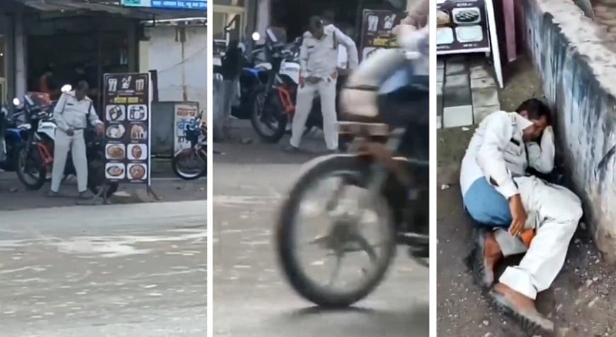 Drunk ASI Spotted Urinating On Busy Road, Sleeping Roadside In MP's Raisen | VIDEO