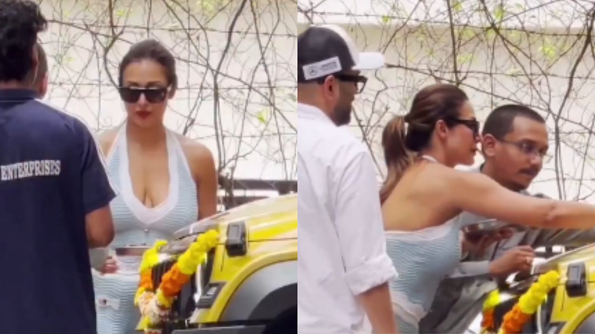 Malaika Arora Criticised For Wearing Footwear & Deep Neckline Outfit While Performing Puja For New Car - VIDEO